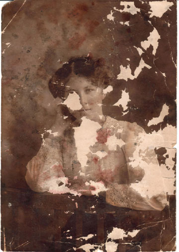 Original Heavily Damaged Picture Before Restoration